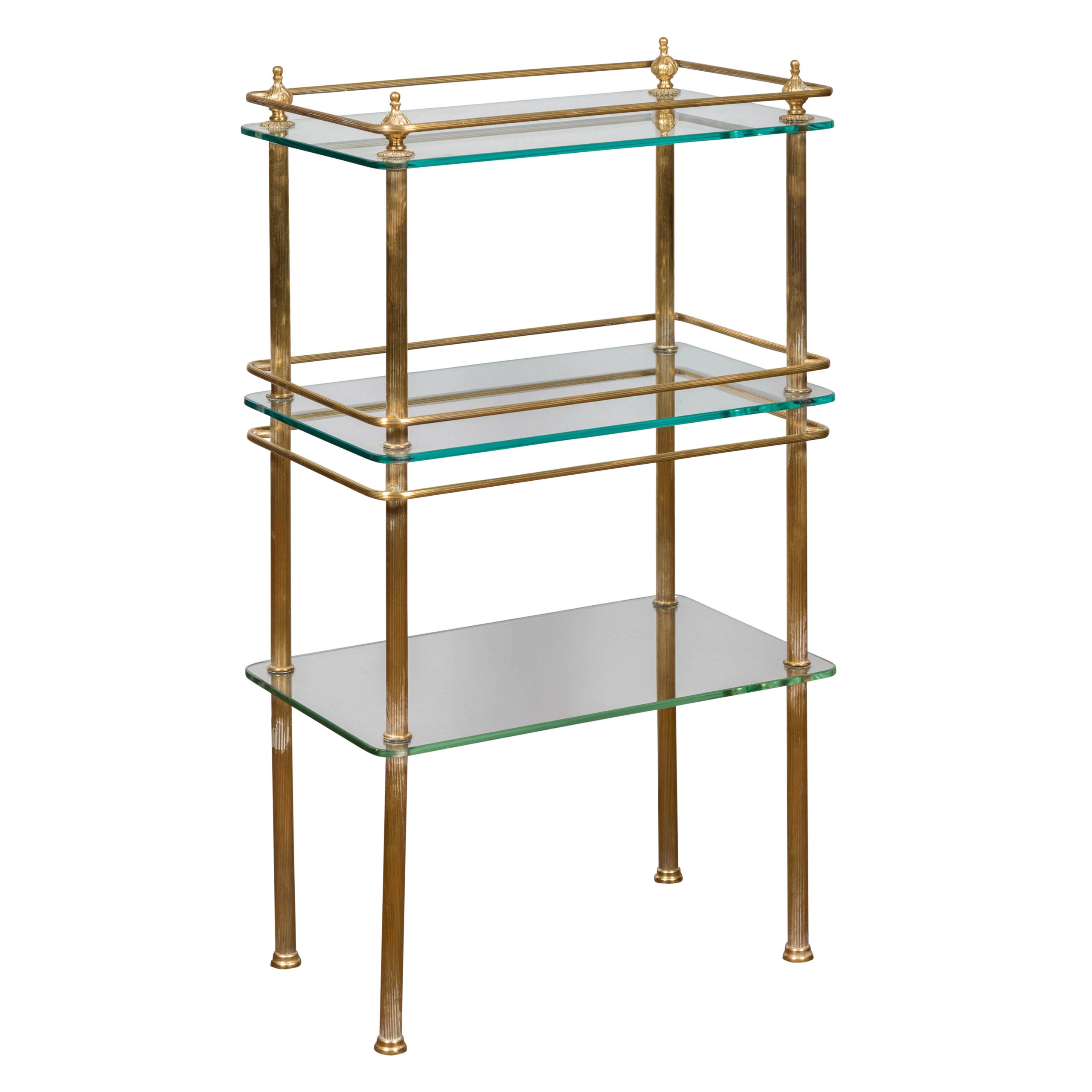 Brass and glass tiered table photographed for a dealer catalog